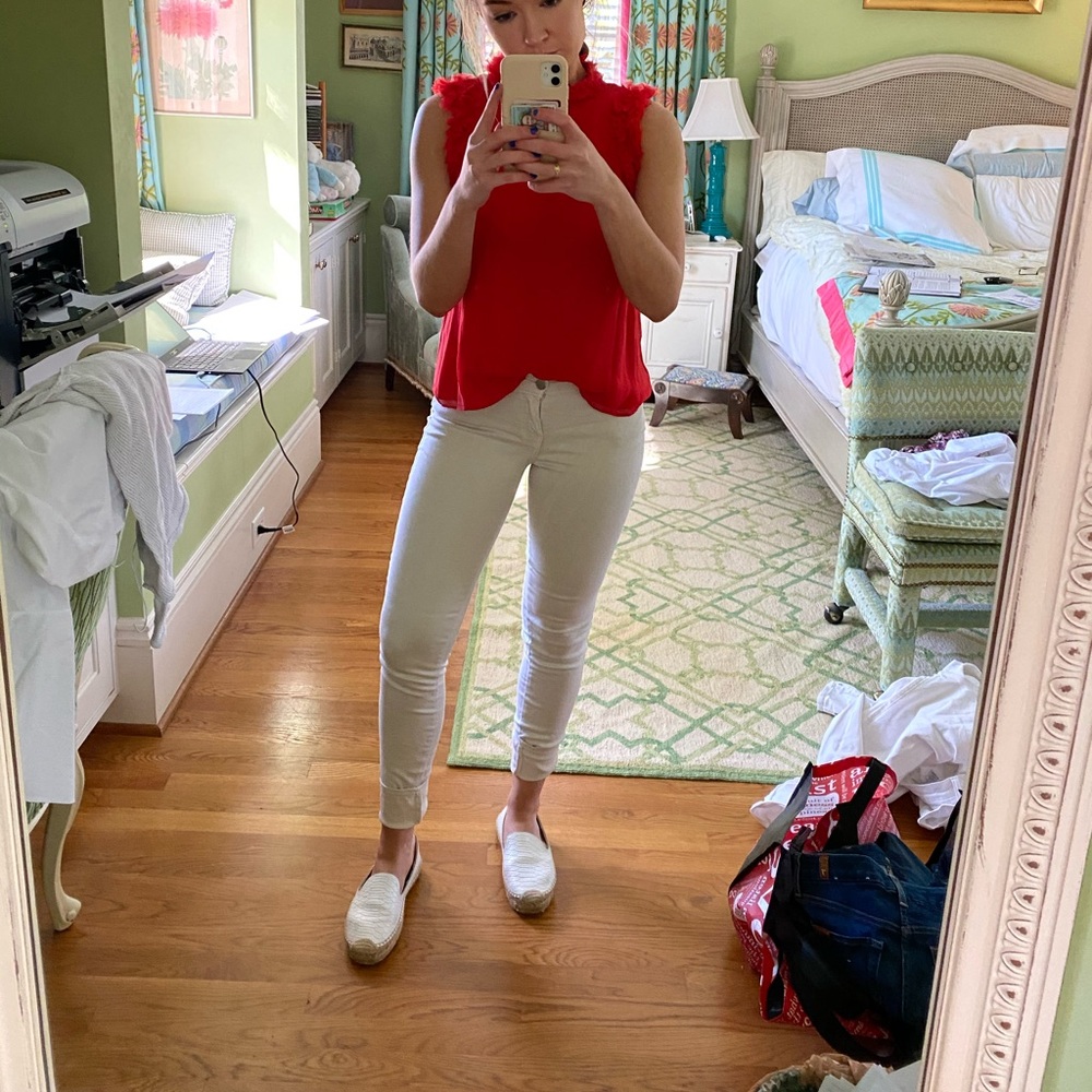 Creme-colored J brand skinny jeans